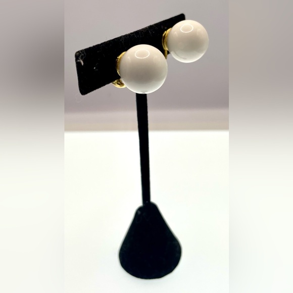 Vintage Signed Monet Gold Tone White
Lucite Ball Clip On Earrings - Picture 3 of 9